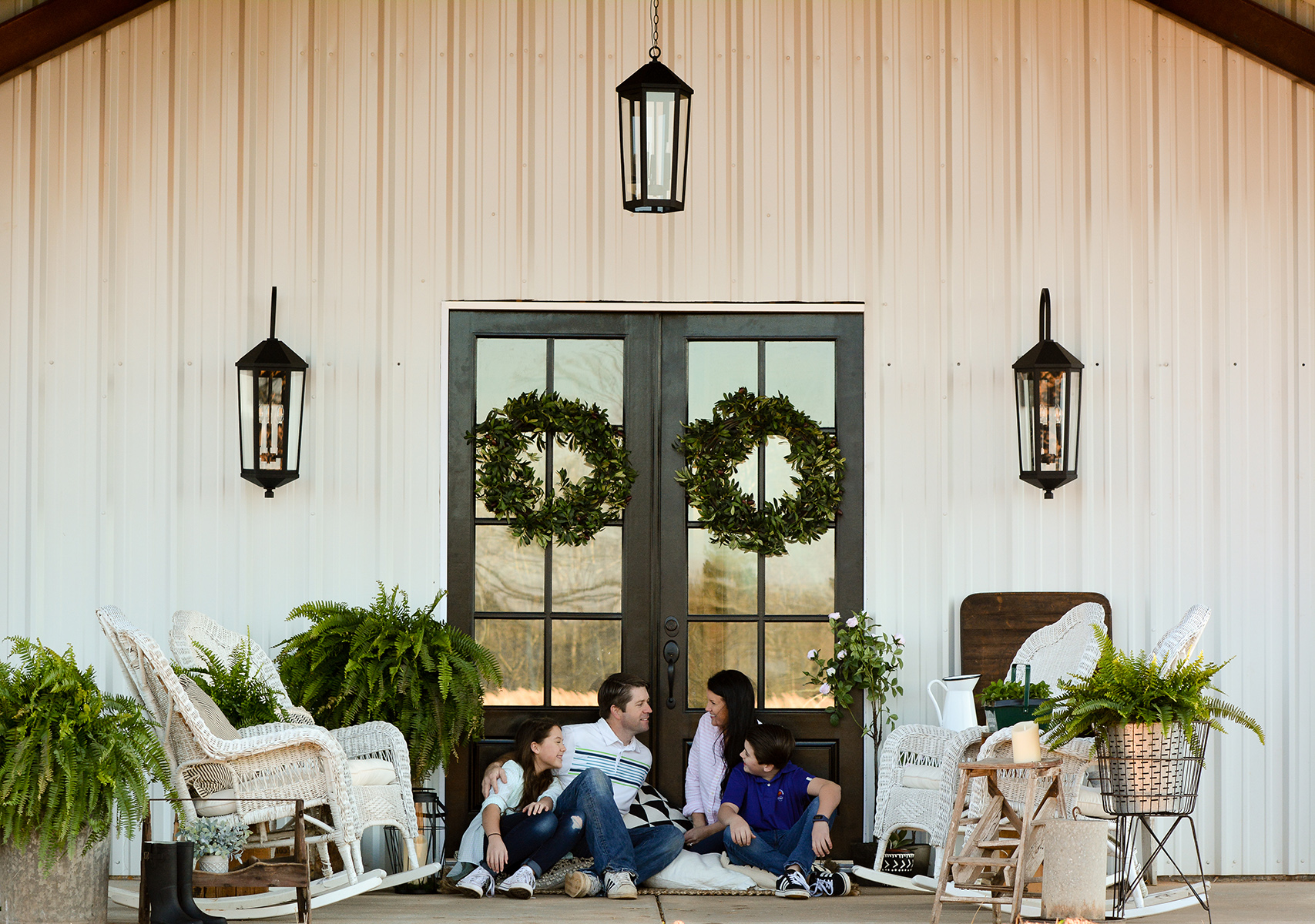 The 2018 Cottages & Bungalows Project House front porch where the Busenitz family spends time together sitting in the rocking chairs.