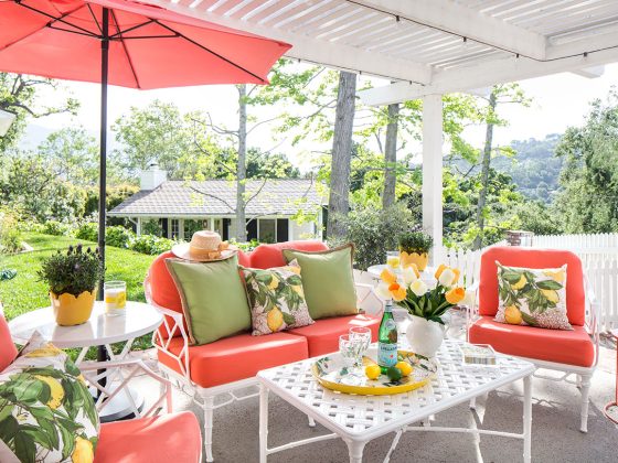 Living Coral patio furniture in a cottage garden