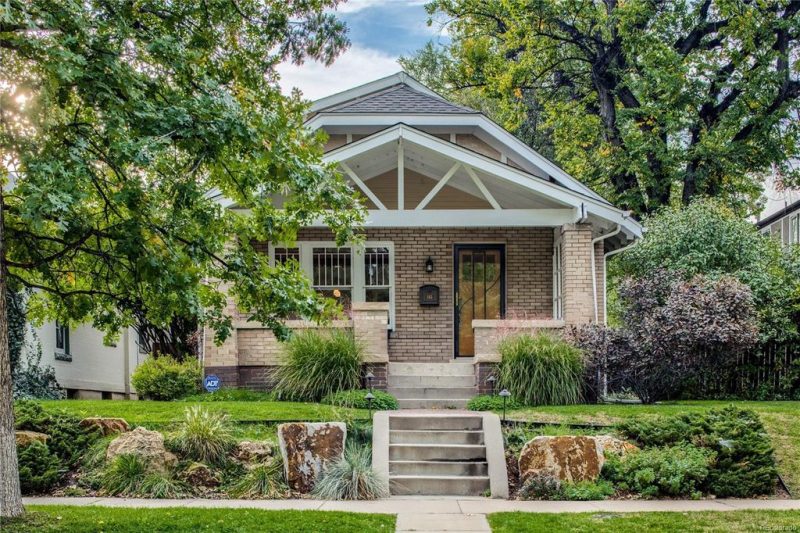 Quaint Denver cottage with an amazing porch and roofline.