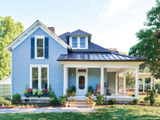 after Project House in Frankline exterior with flowers and blue siding