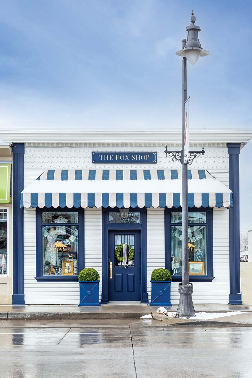 The Fox Shop storefront white with blue details